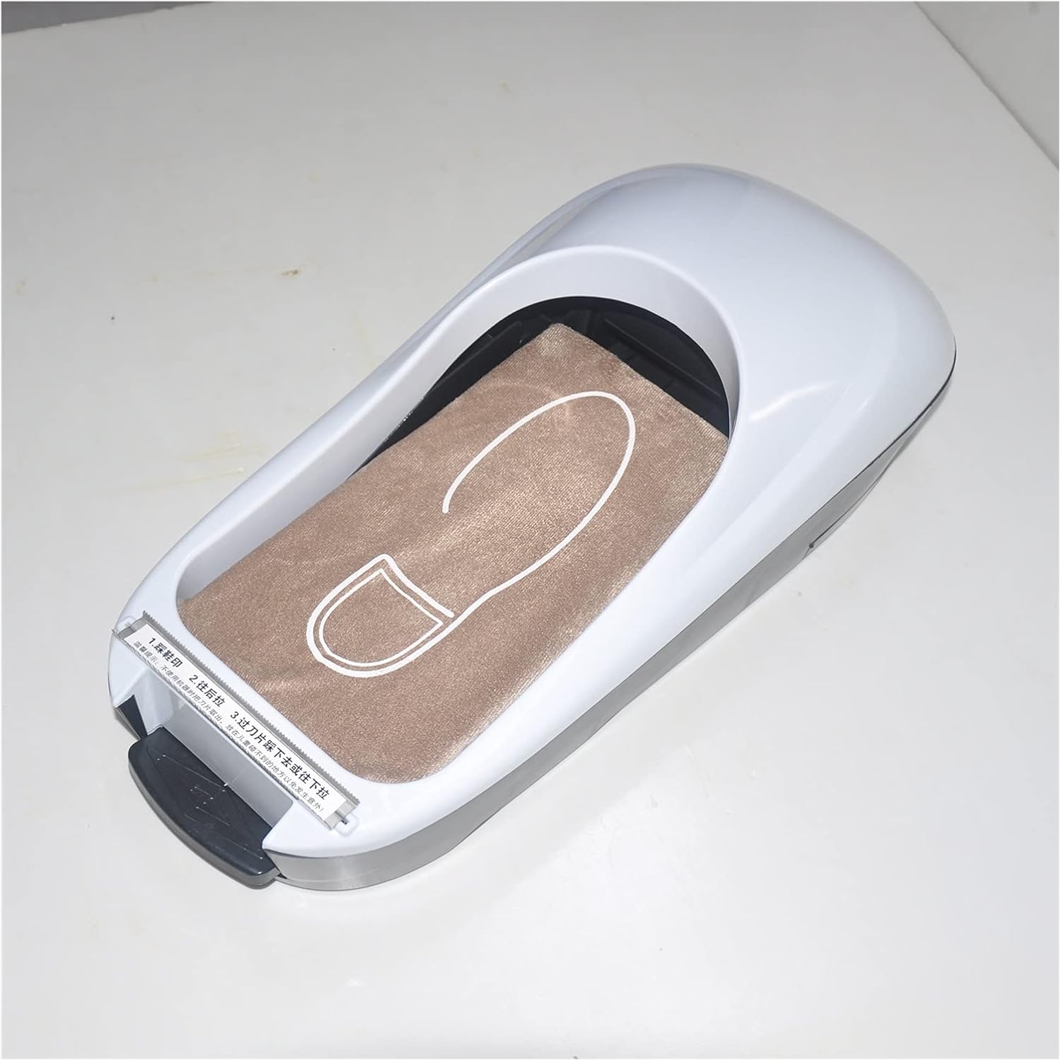 Car-Style Shoe Cover Dispenser ©